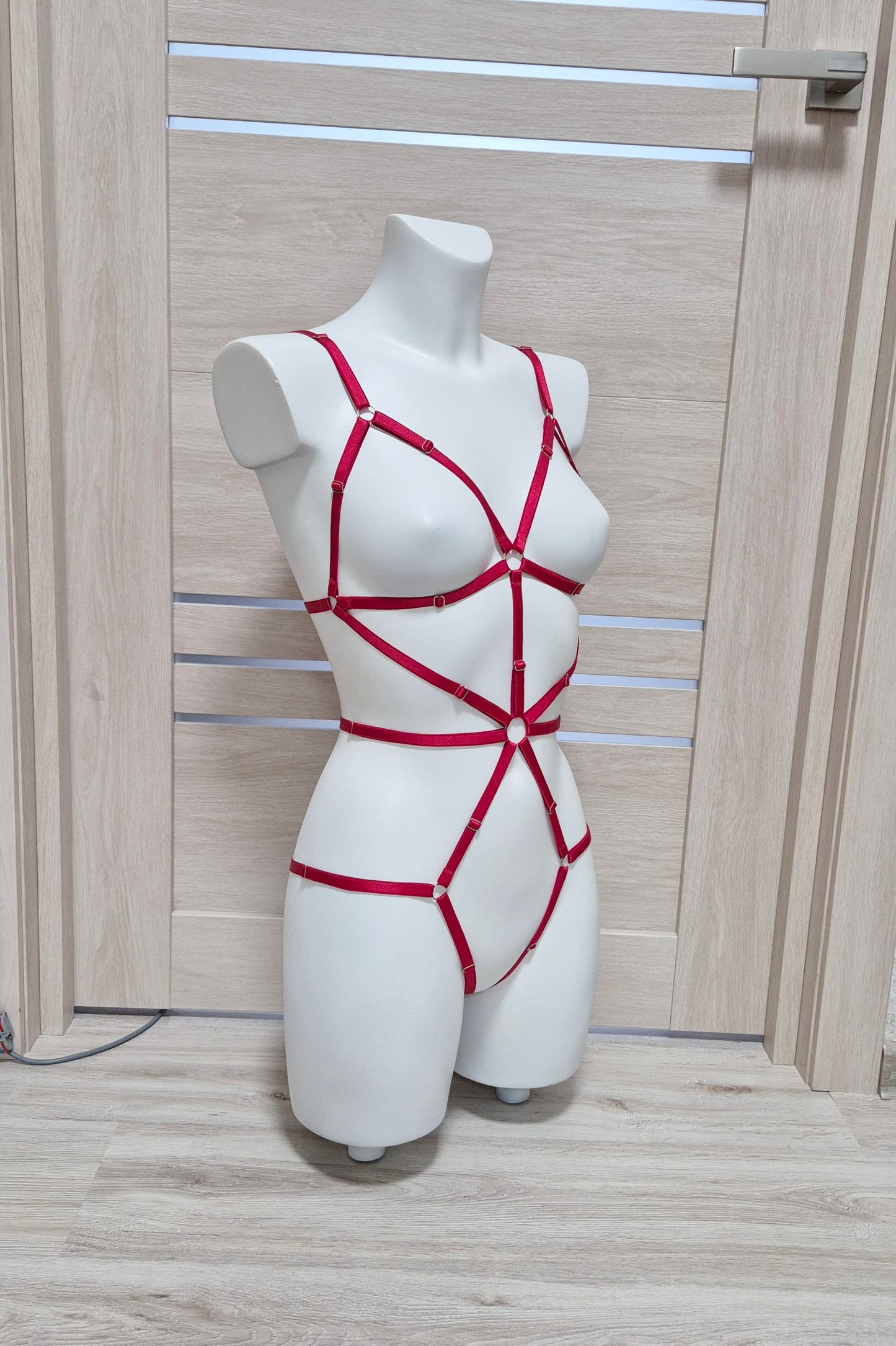 Terpsichore - red cupless harness catsuit female
