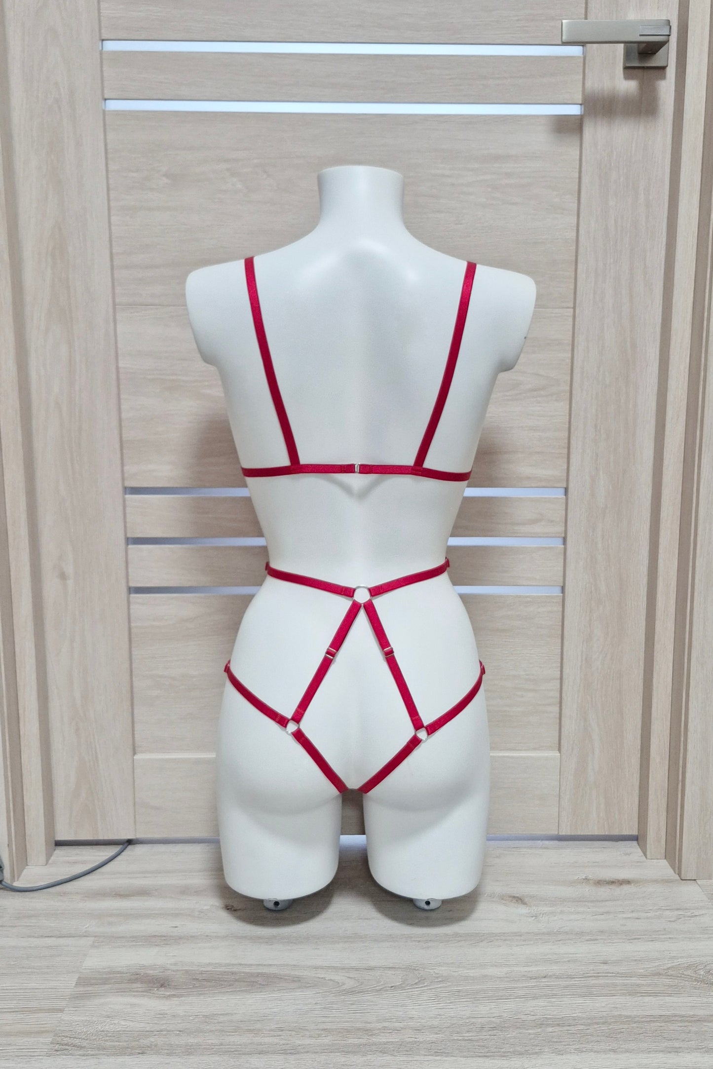 Terpsichore - red cupless harness catsuit female